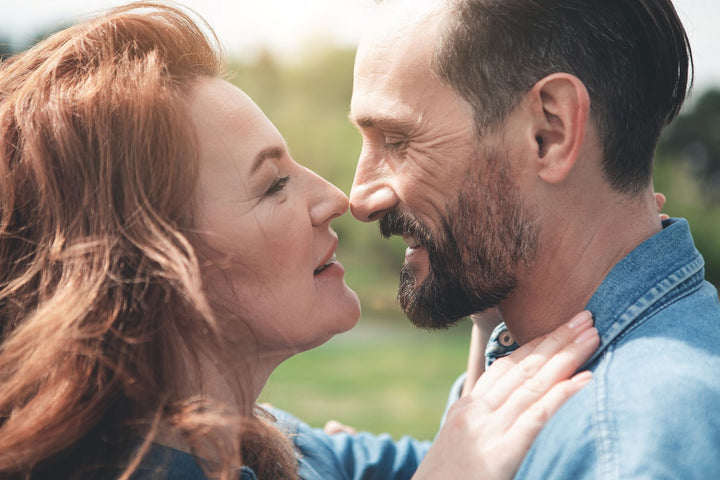 HOW DOES A MAN OF IHow does a Man of Integrity make his wife feel? Here a matrue Greek man with distinctively groomed beart, mustache and hair looks into his sweetheart's eyes. She's a beautiful mature redhead who looks at him with a deep gaze of love and appreciation as they embrace noses almost touching